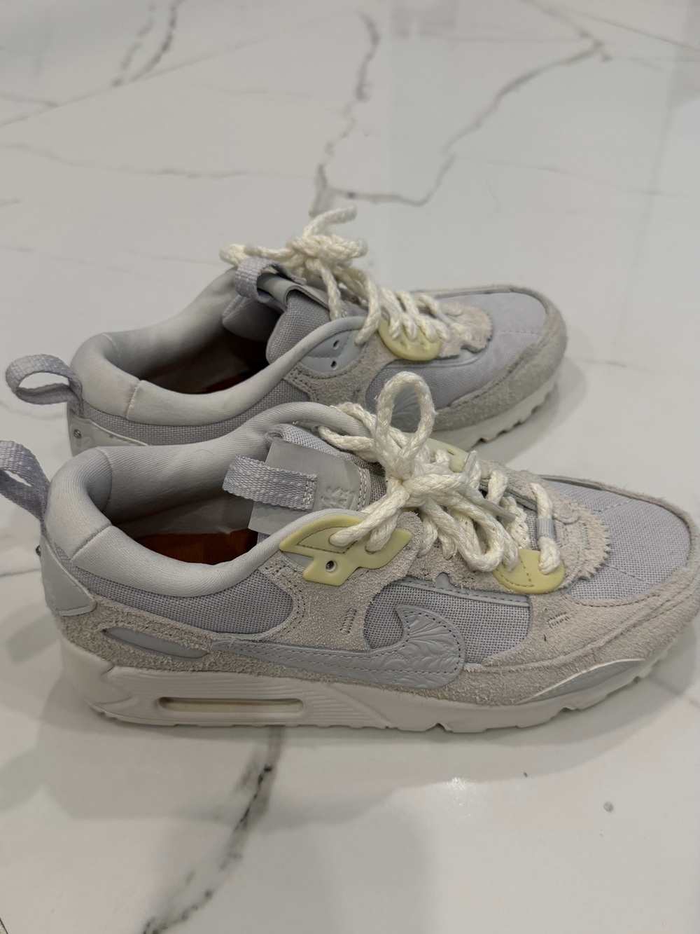 Nike Women’s Sneakers in Light Gray and Cream Accents